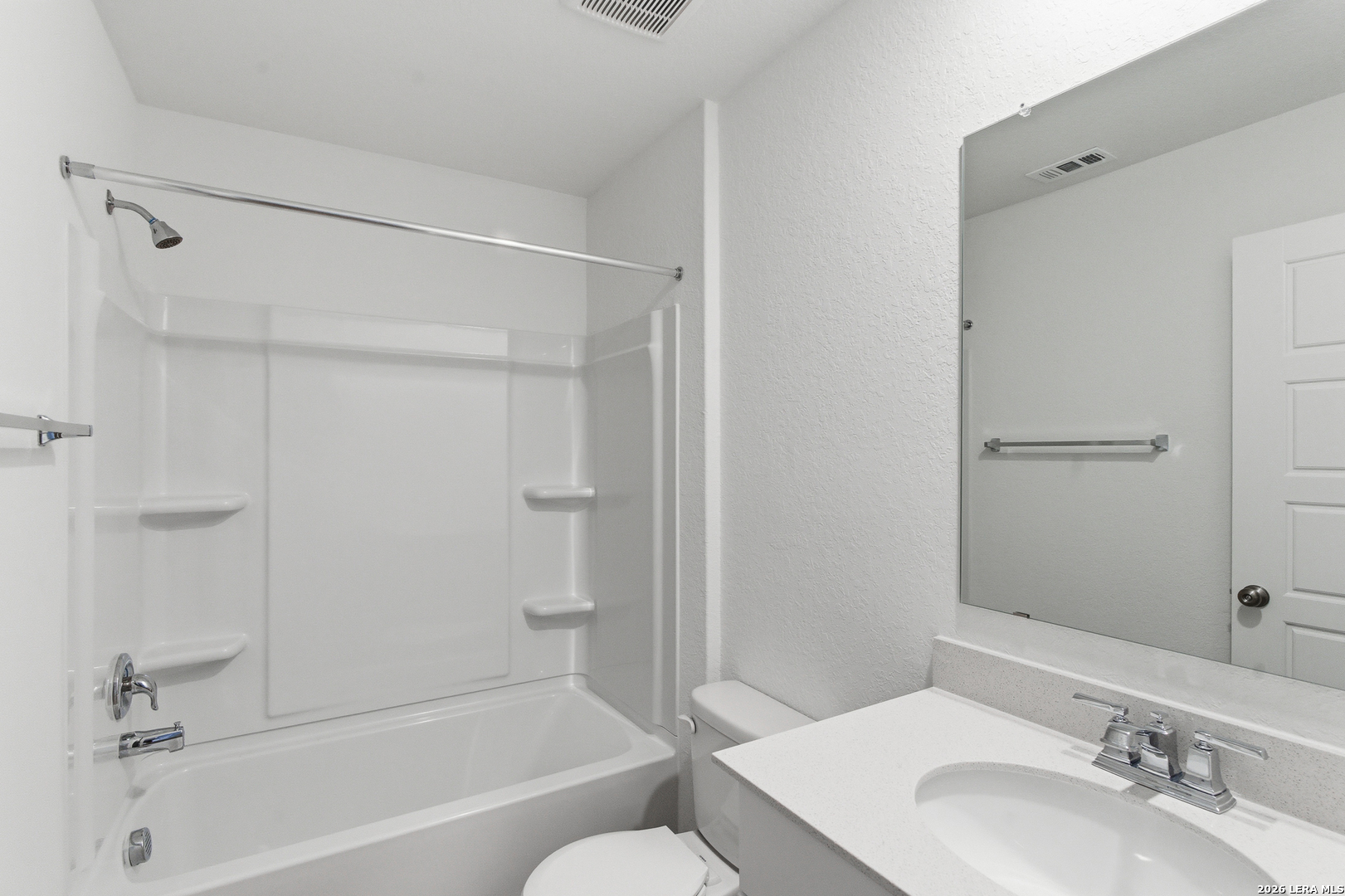 4142 Bermuda Lane Seguin, TX 78155 - Photo 23 of 30 a bathroom with a bathtub shower sink vanity and toilet