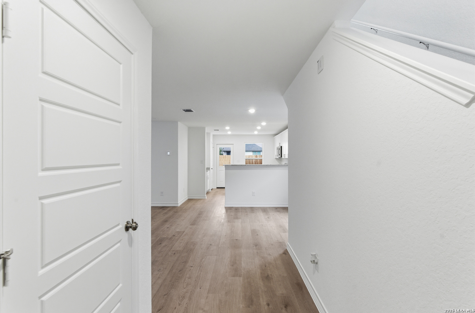 4142 Bermuda Lane Seguin, TX 78155 - Photo 4 of 30 a view of a hallway with wooden floor