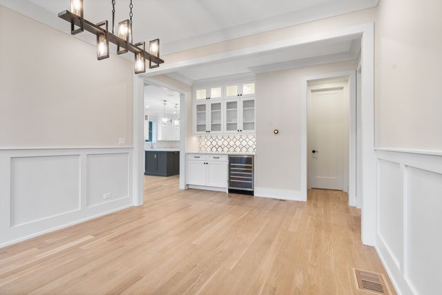 a view of a kitchen with a sink and cabinet area