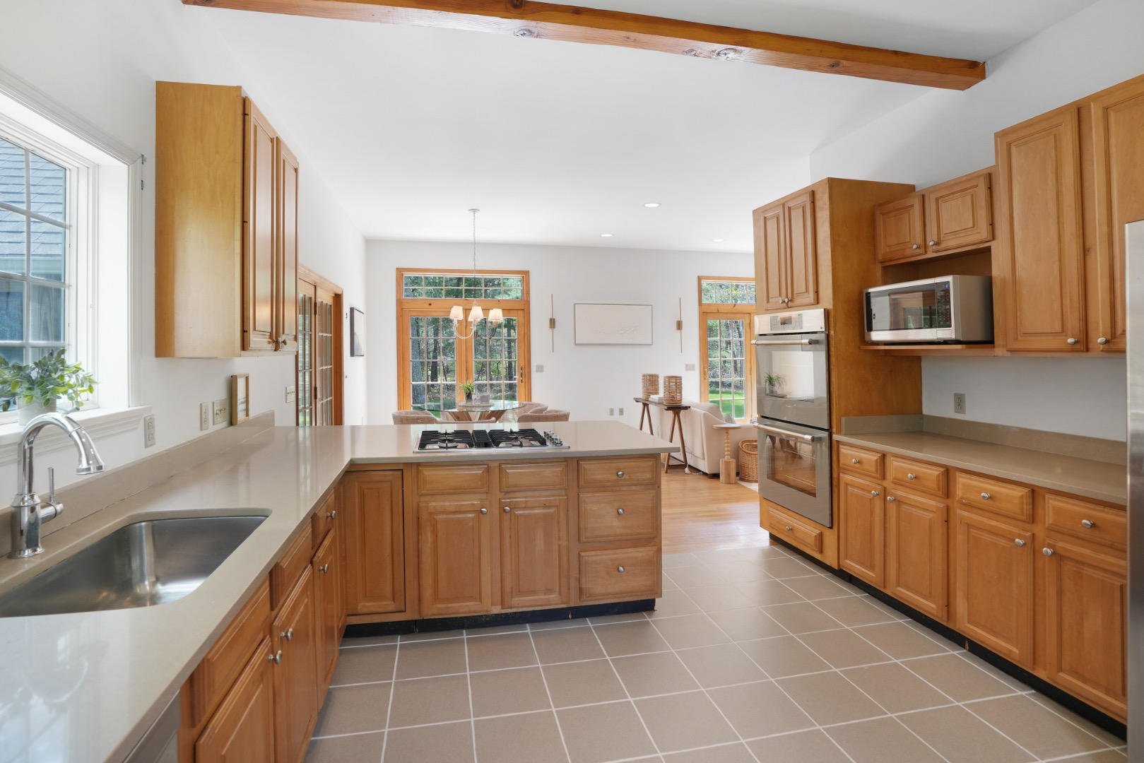 2 Cosmos Way Edgartown, MA 02539 - Photo 11 of 29 a large kitchen with stainless steel appliances lots of counter space and a sink