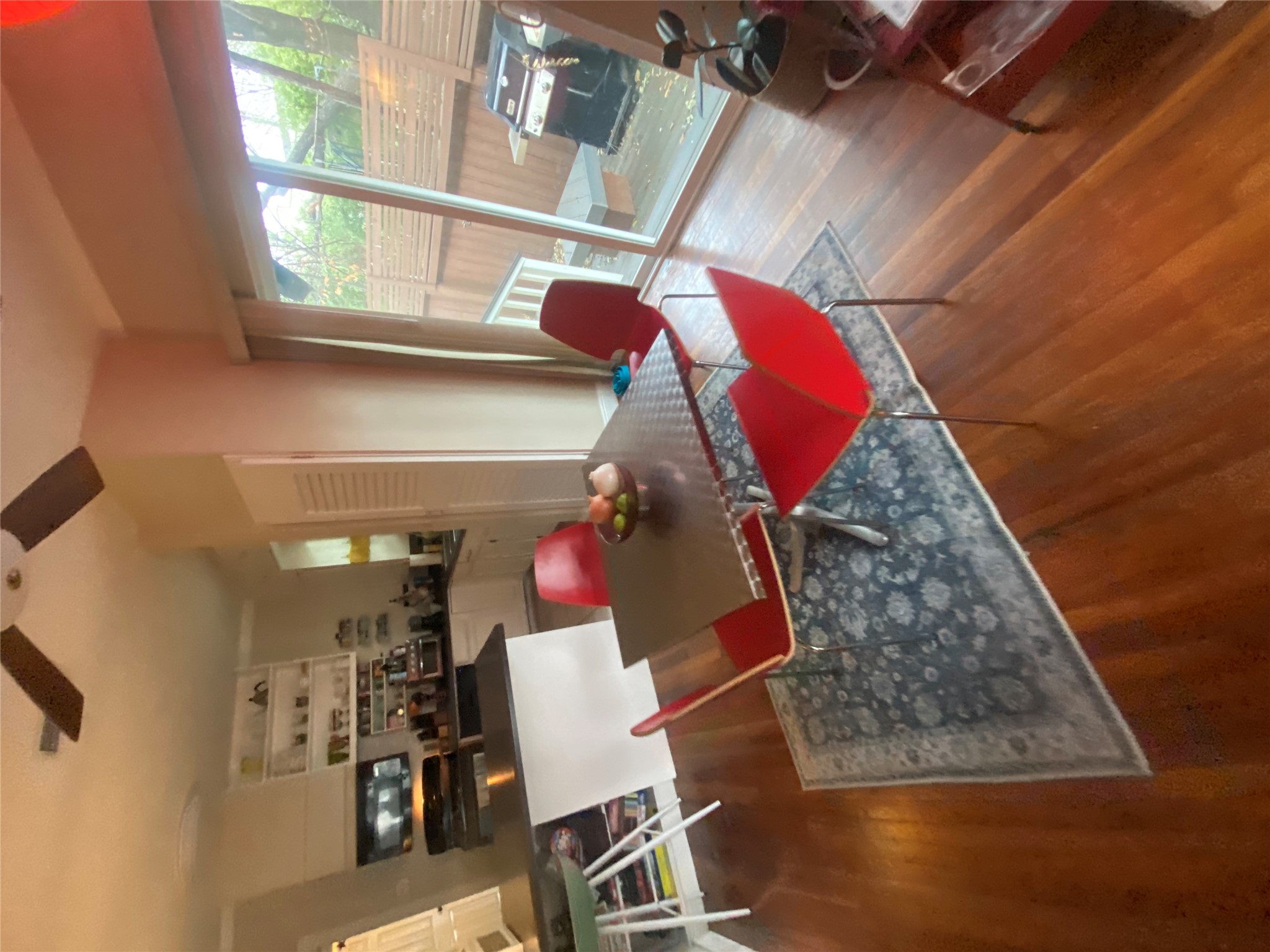 3010 Fruth Street, Unit A Austin, TX 78705 - Photo 7 of 39 Dining area featuring wood-finish flooring and a ceiling fan