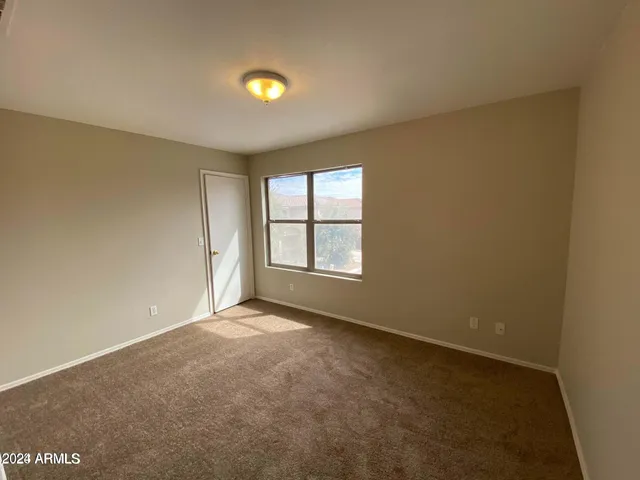 a view of a pathway besides a building