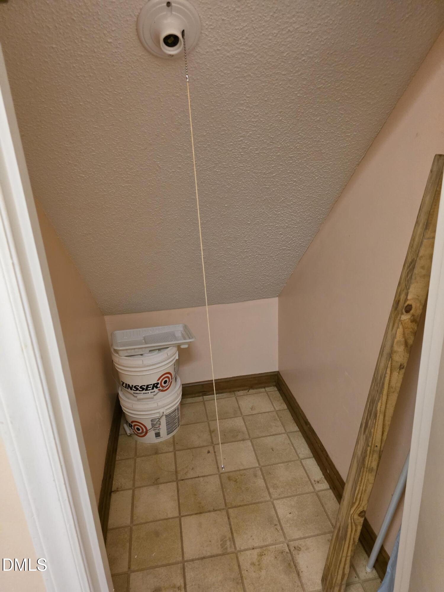 8336 McGuire Drive Raleigh, NC 27616 - Photo 7 of 23 Storage Under Staicase