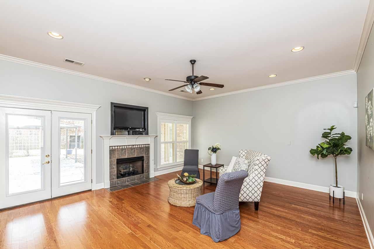47 Clementine Road Atoka, TN 38004 - Photo 10 of 40 a living room with furniture a fireplace and a flat screen tv