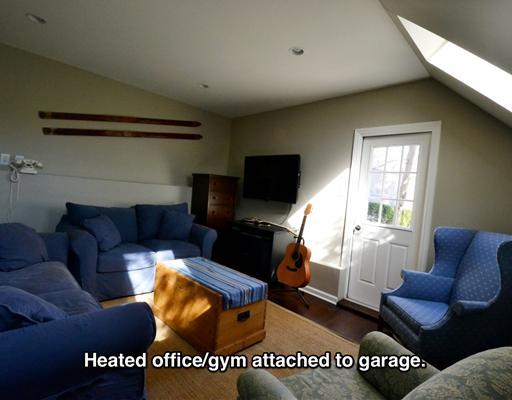 47 Sinawoy Road Cos Cob, CT 06807 - Photo 8 of 10 a living room with furniture and a flat screen tv