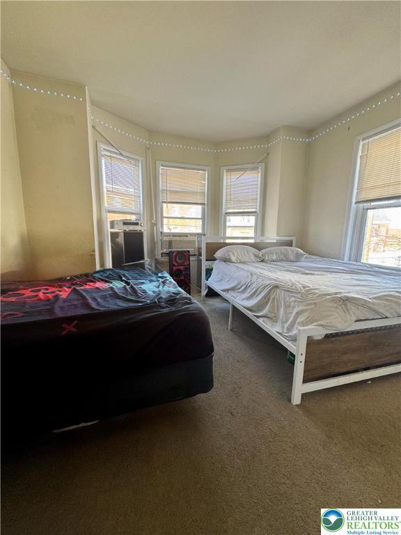 414 Washington Street Allentown, PA 18102 - Photo 14 of 23 a bedroom with two bed and window