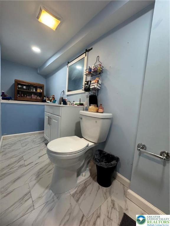 414 Washington Street Allentown, PA 18102 - Photo 22 of 23 a bathroom with a toilet a sink and a bathtub