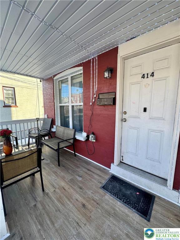 414 Washington Street Allentown, PA 18102 - Photo 3 of 23 a livingroom with furniture and wooden floor