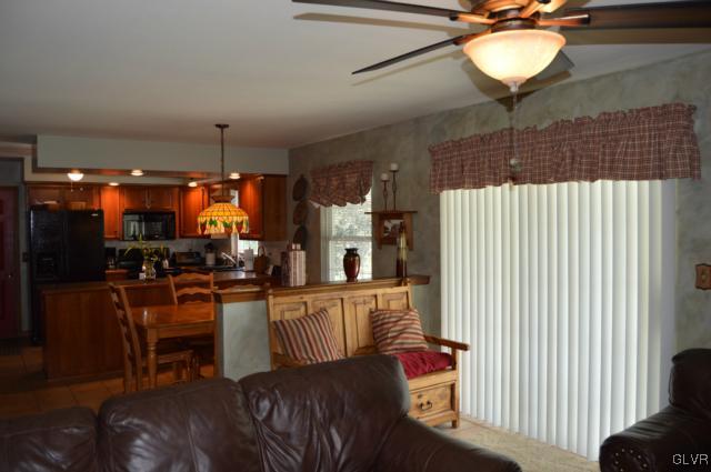 6168 Mud Run Road Nazareth, PA 18064 - Photo 13 of 35 a dining room with furniture and a chandelier
