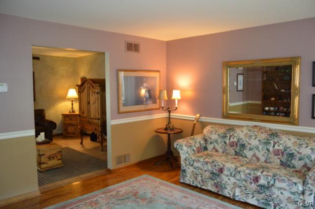 6168 Mud Run Road Nazareth, PA 18064 - Photo 16 of 35 a bedroom with a bed and wooden floor