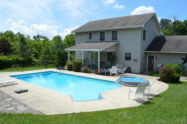 6168 Mud Run Road Nazareth, PA 18064 - Photo 2 of 35 a view of a house with swimming pool and sitting area