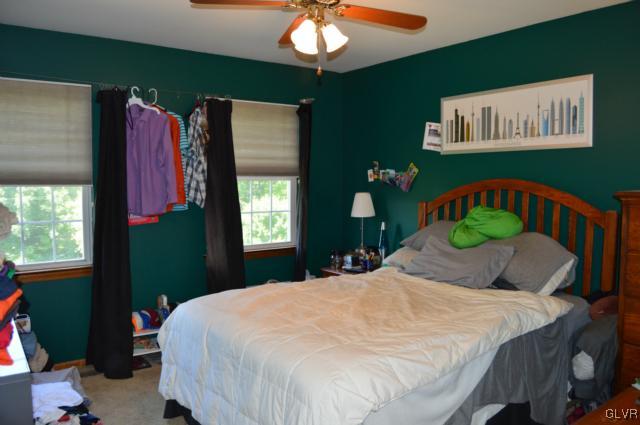 6168 Mud Run Road Nazareth, PA 18064 - Photo 21 of 35 a bed sitting in a bedroom next to a window