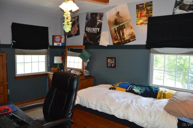 6168 Mud Run Road Nazareth, PA 18064 - Photo 22 of 35 a bedroom with furniture and a flat screen tv