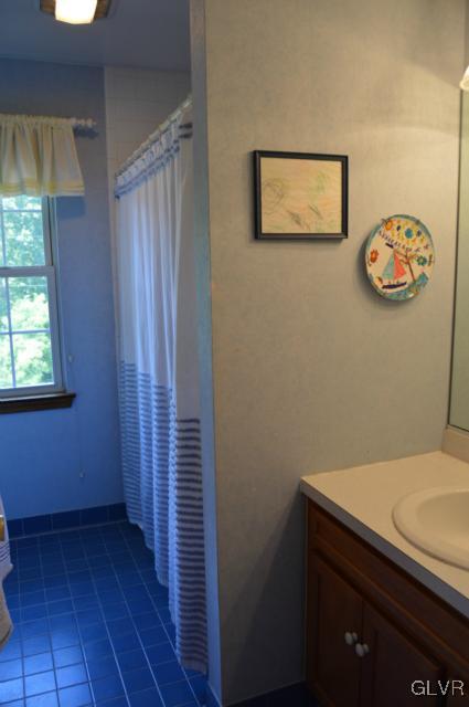 6168 Mud Run Road Nazareth, PA 18064 - Photo 24 of 35 a bathroom with a sink and a window