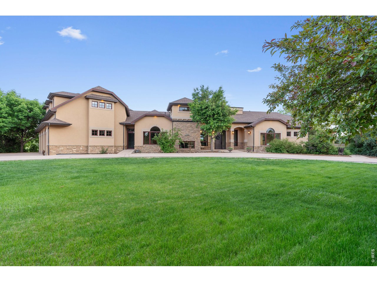 964 Riparian Way Fort Collins, CO 80524 - Photo 14 of 42 a view of an house with backyard and garden