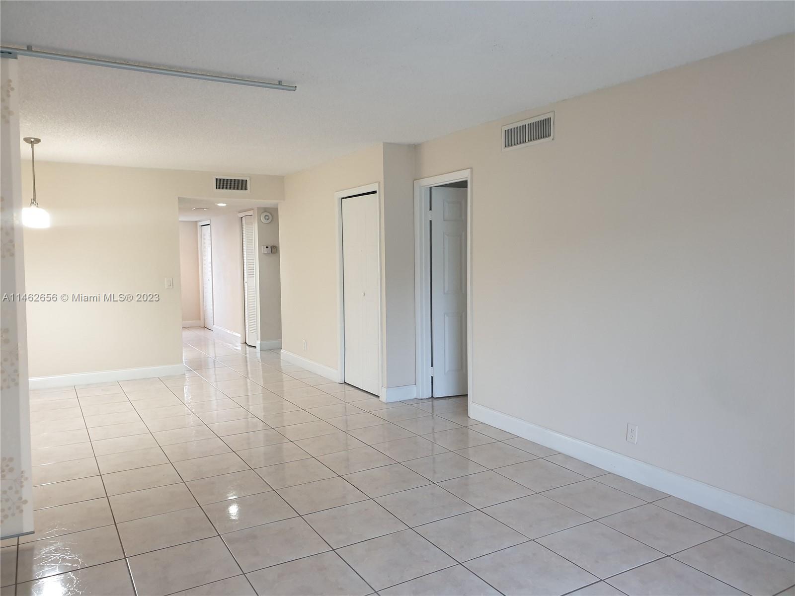 380 Racquet Club Road, Unit 202 Weston, FL 33326 - Photo 8 of 34 a view of an empty room