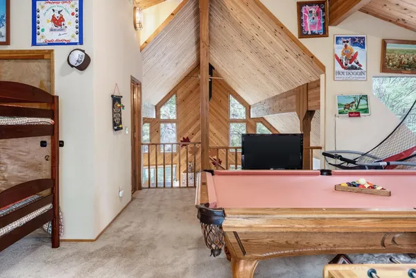 a view of room with a flat screen tv