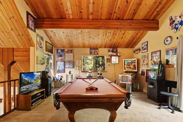 a room with furniture and a flat screen tv