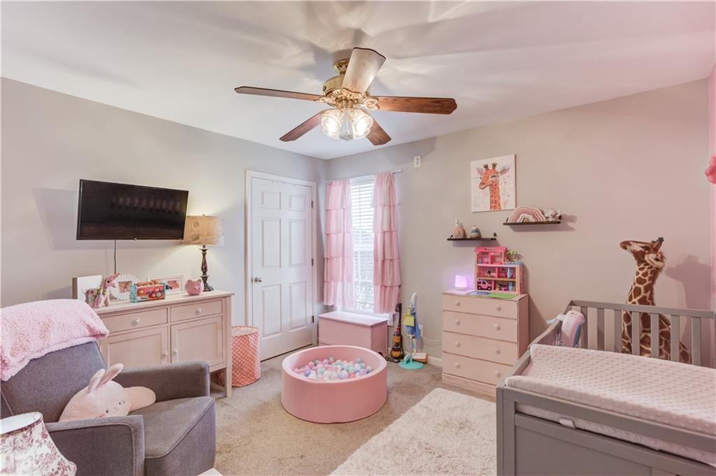 2630 Snowcrest Place Bethlehem, GA 30620 - Photo 18 of 39 a living room with furniture and a flat screen tv
