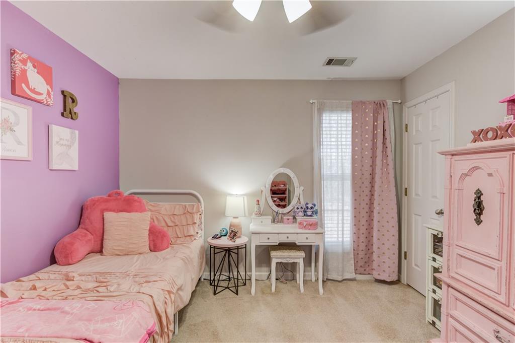 2630 Snowcrest Place Bethlehem, GA 30620 - Photo 20 of 39 a bedroom with a bed and a table in it