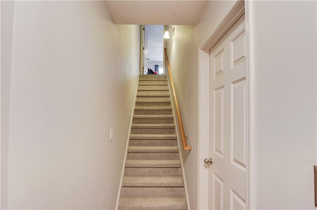 2630 Snowcrest Place Bethlehem, GA 30620 - Photo 22 of 39 a view of a hallway with stairs
