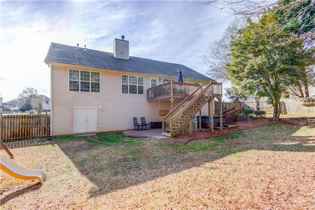 2630 Snowcrest Place Bethlehem, GA 30620 - Photo 32 of 39 a front view of a house with a yard