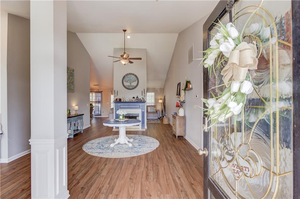 2630 Snowcrest Place Bethlehem, GA 30620 - Photo 5 of 39 a living room with a table and chairs