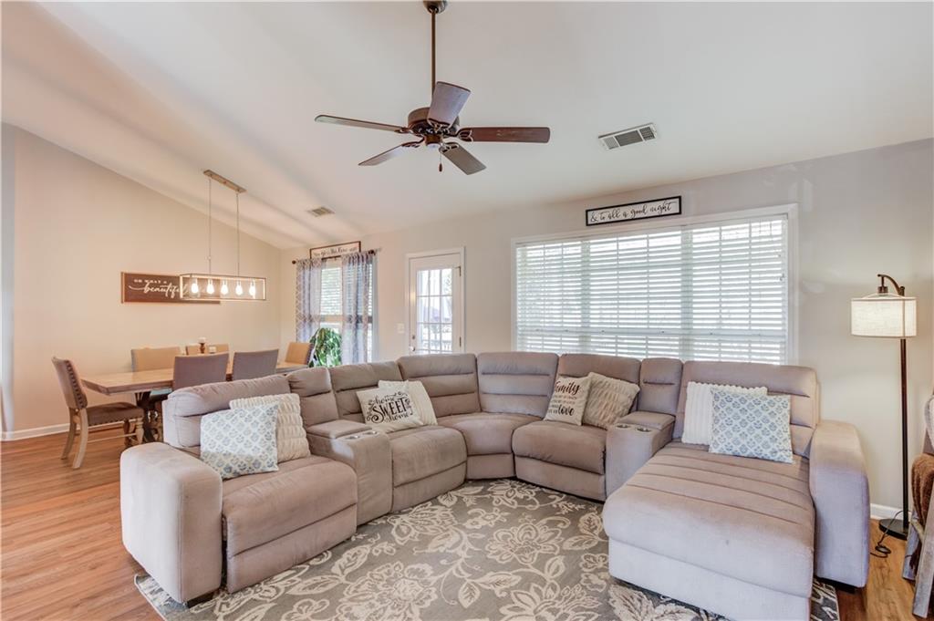 2630 Snowcrest Place Bethlehem, GA 30620 - Photo 10 of 39 a living room with furniture and a large window