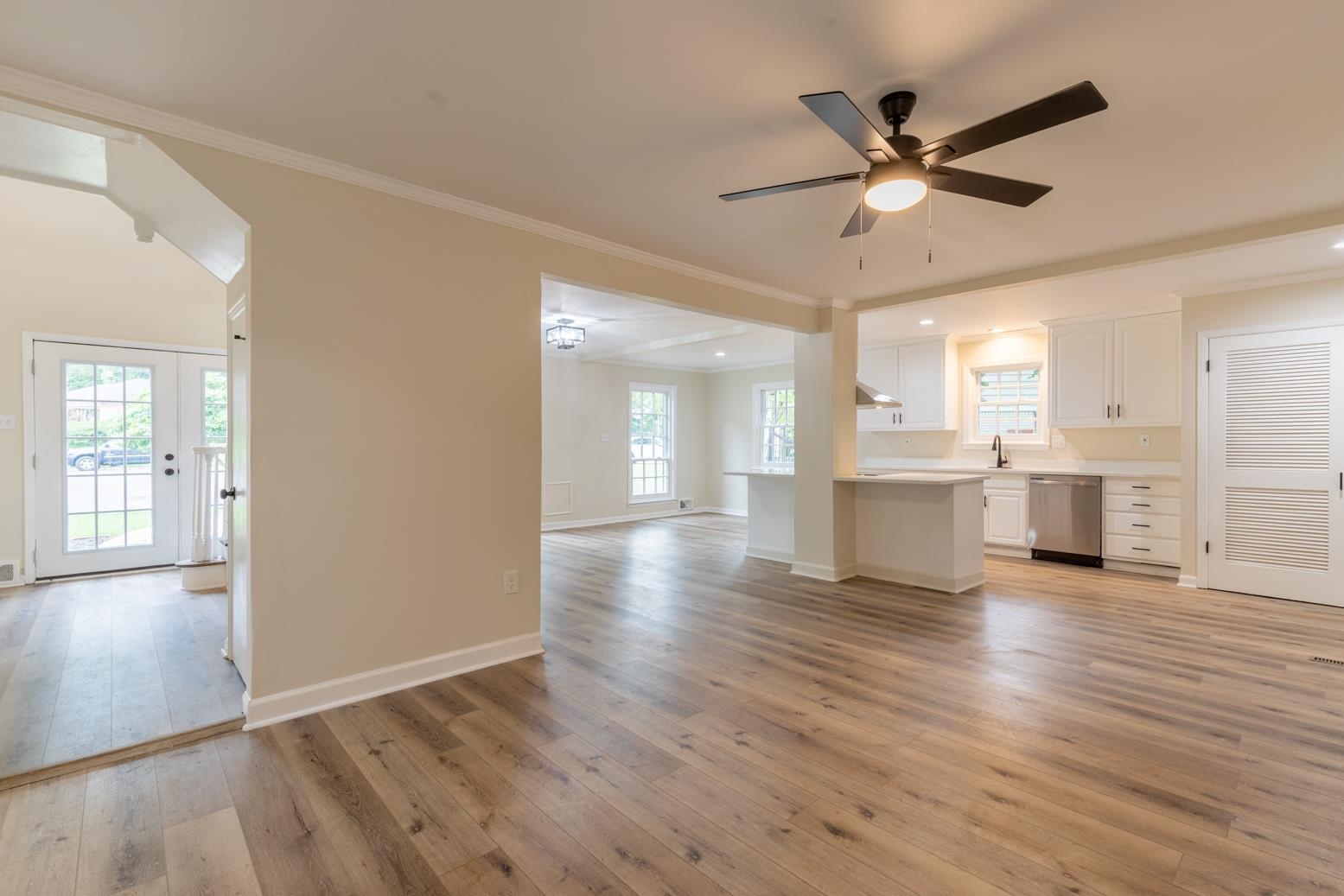 505 Thorn Ridge Cove Memphis, TN 38117 - Photo 13 of 31 a view of a kitchen with wooden floor and a window