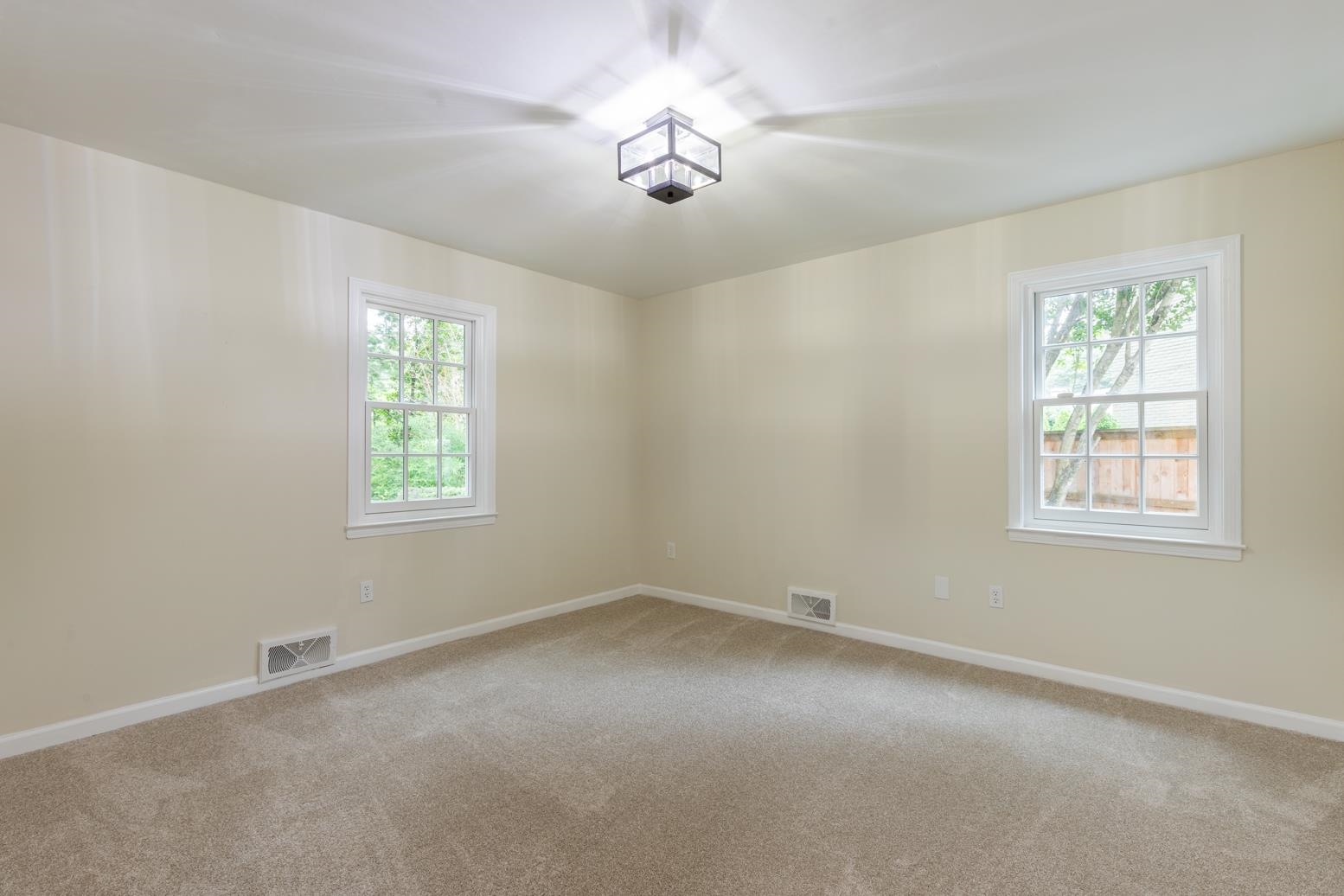 505 Thorn Ridge Cove Memphis, TN 38117 - Photo 23 of 31 an empty room with a window and a fan