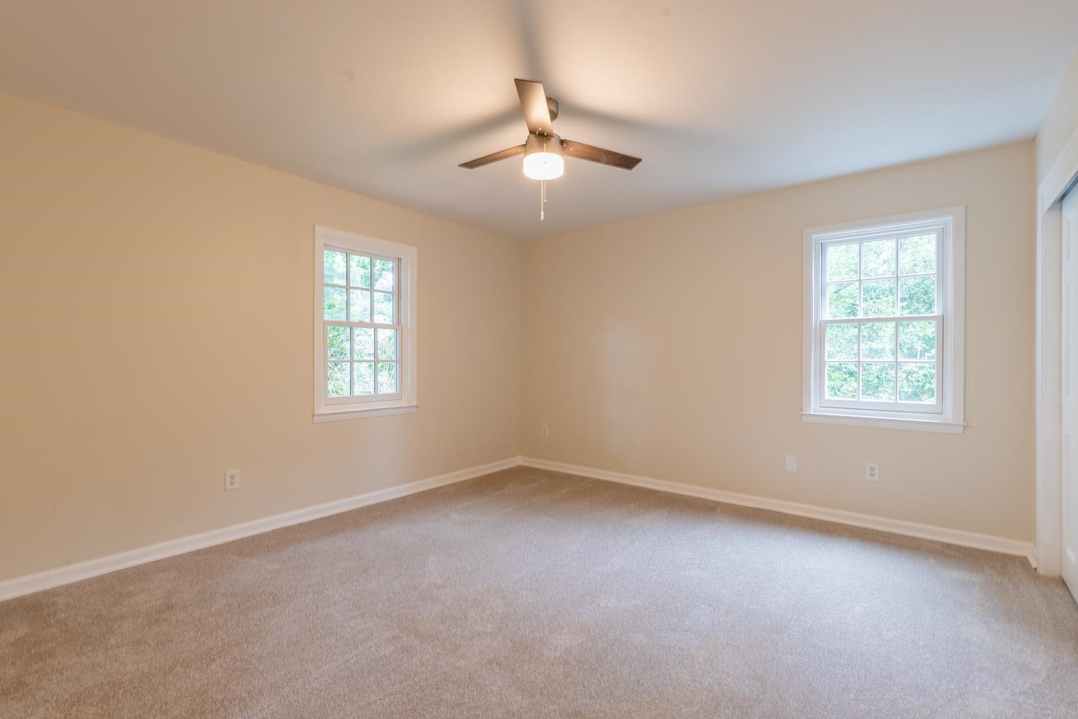 505 Thorn Ridge Cove Memphis, TN 38117 - Photo 26 of 31 an empty room with a window and a fan