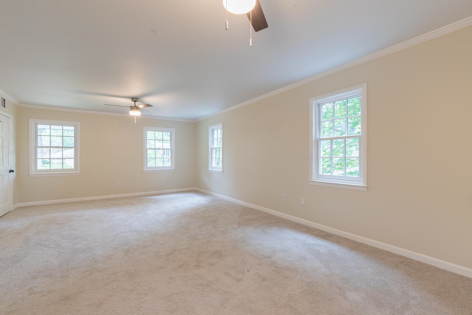 505 Thorn Ridge Cove Memphis, TN 38117 - Photo 28 of 31 Carpeted empty room with ornamental molding and ceiling fan