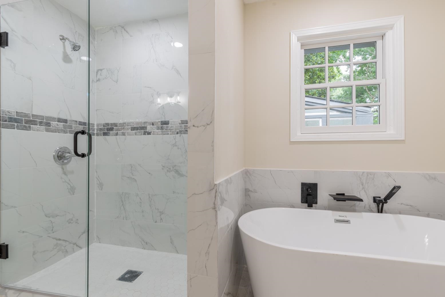 505 Thorn Ridge Cove Memphis, TN 38117 - Photo 4 of 31 a white bath tub sitting next to a shower