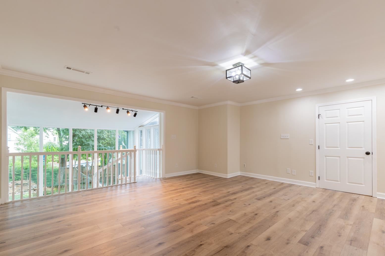 505 Thorn Ridge Cove Memphis, TN 38117 - Photo 6 of 31 Empty room featuring crown molding and light hardwood / wood-style flooring