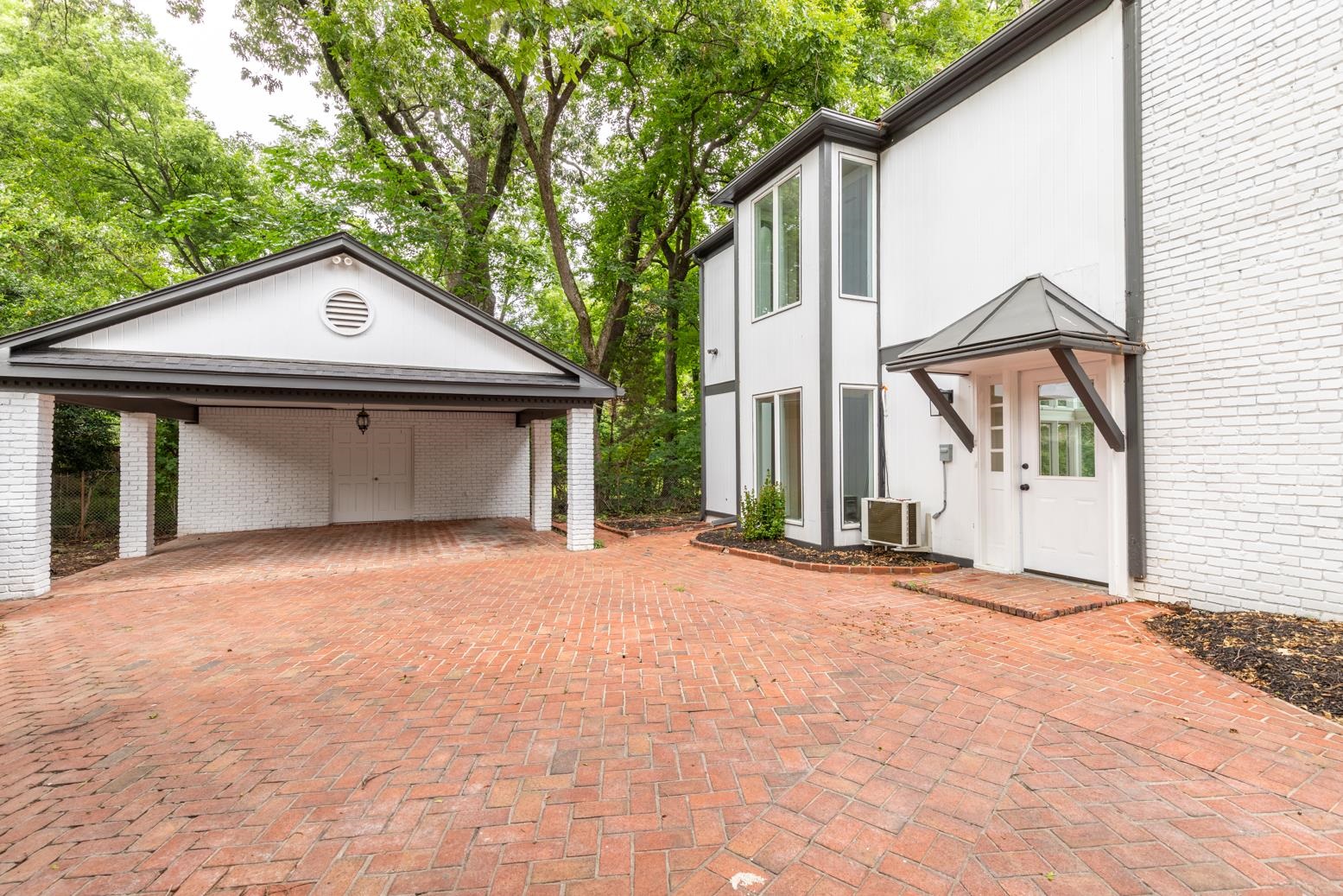 505 Thorn Ridge Cove Memphis, TN 38117 - Photo 7 of 31 View of patio / terrace featuring a carport and central AC unit
