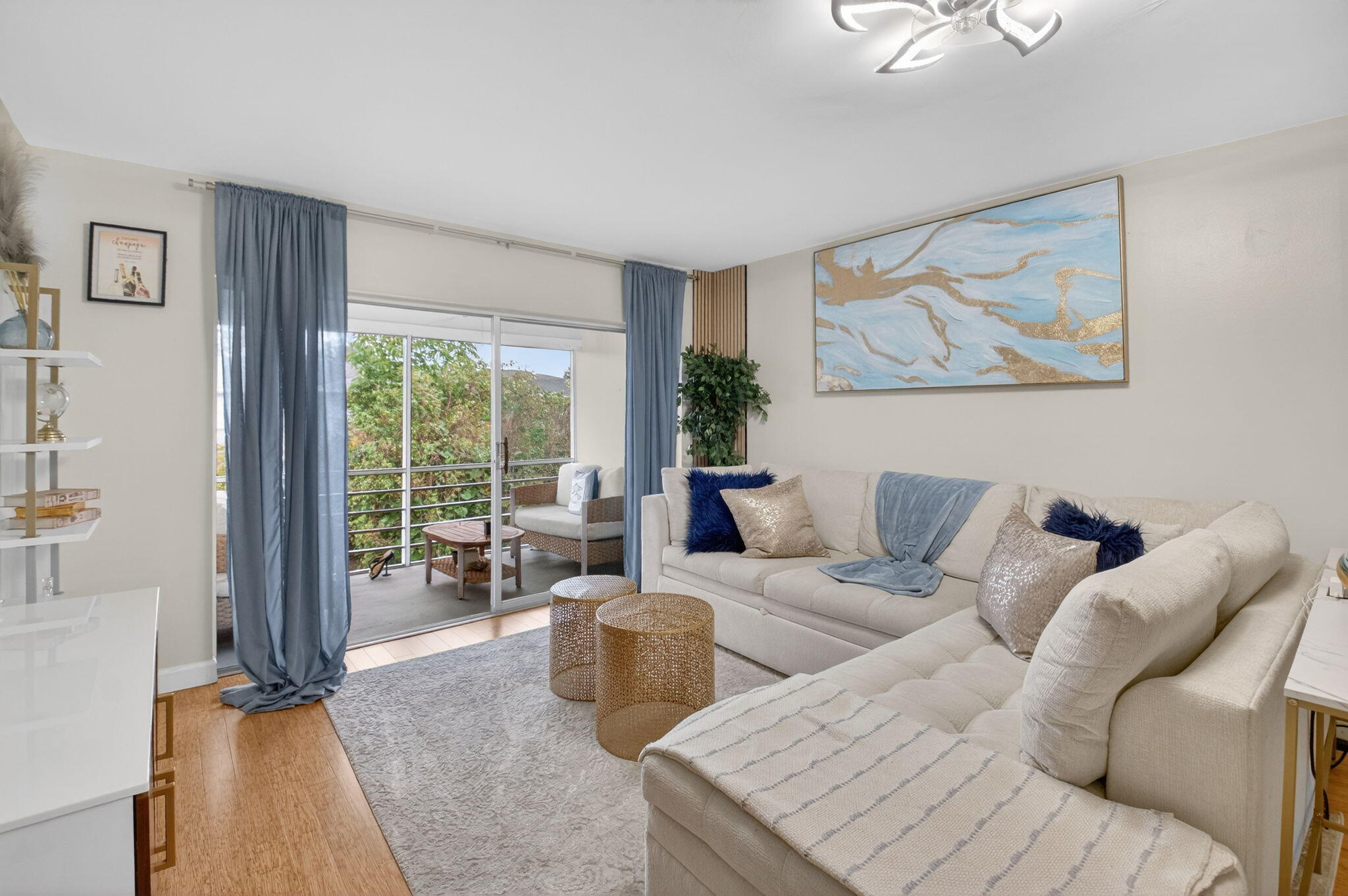 2340 Southwest 22nd Avenue, Unit 312 Delray Beach, FL 33445 - Photo 14 of 45 a living room with furniture and a large window