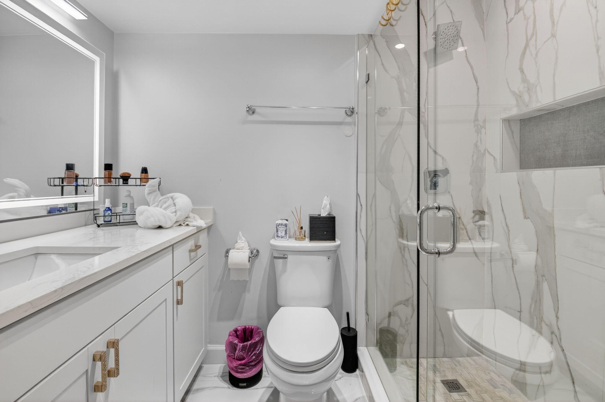 2340 Southwest 22nd Avenue, Unit 312 Delray Beach, FL 33445 - Photo 21 of 45 a bathroom with a sink toilet and shower