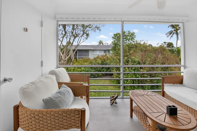 a room with furniture and a window