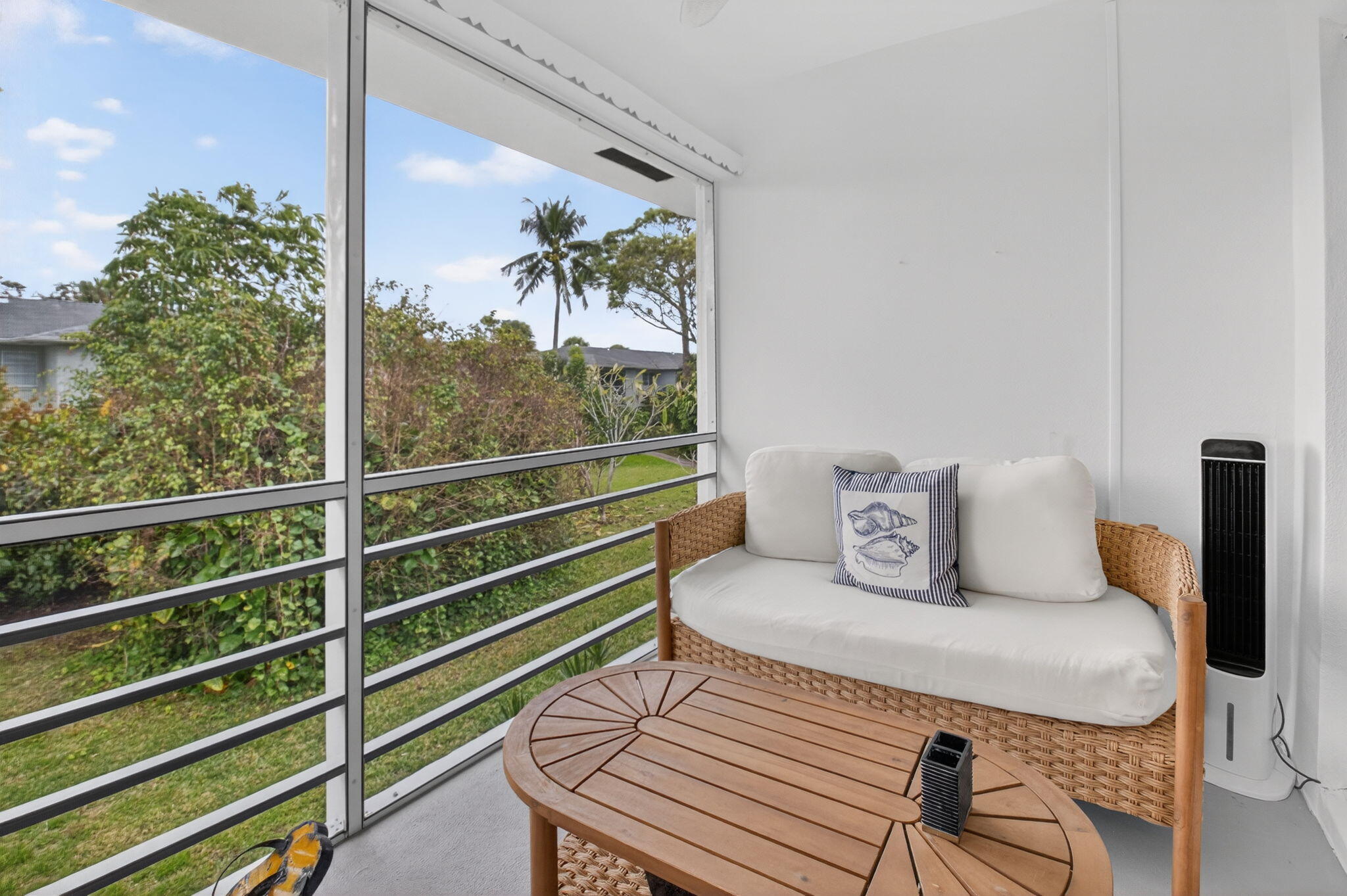 2340 Southwest 22nd Avenue, Unit 312 Delray Beach, FL 33445 - Photo 29 of 45 a living room with furniture