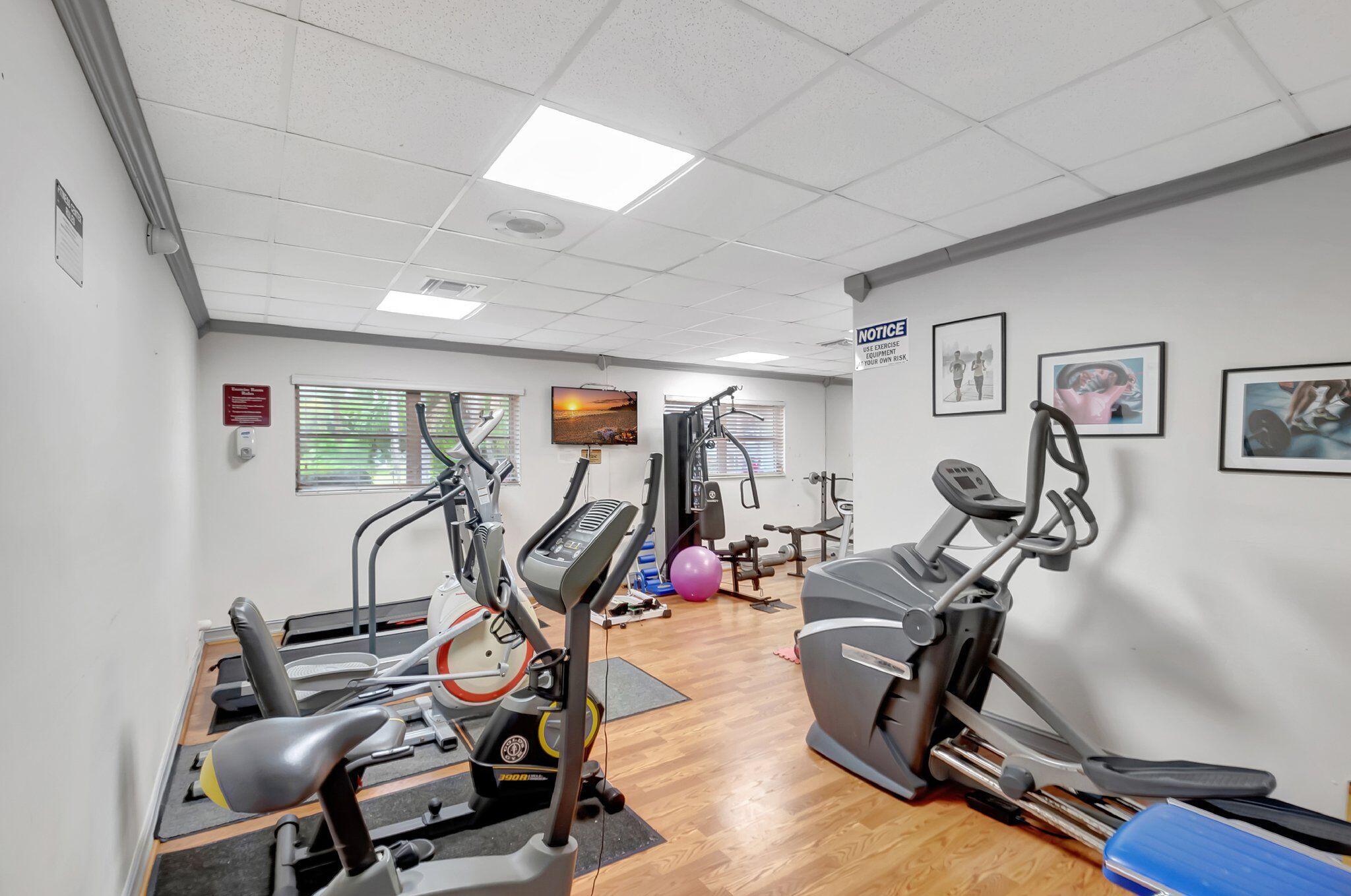 2340 Southwest 22nd Avenue, Unit 312 Delray Beach, FL 33445 - Photo 33 of 45 a view of a room with gym equipment