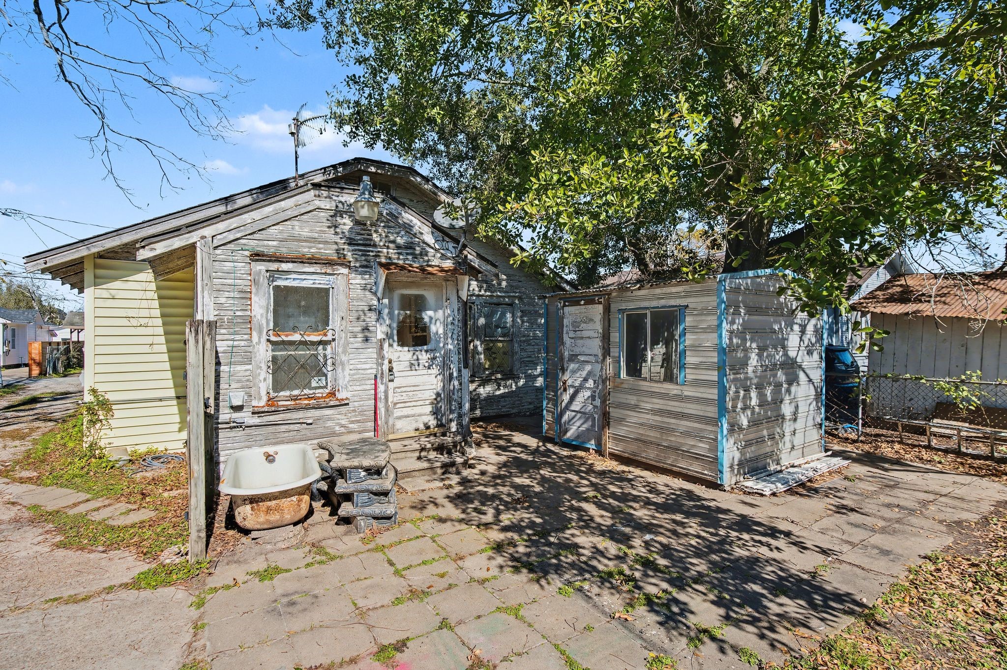 1218 Genova Street Houston, TX 77009 - Photo 8 of 15 a front view of a house with a yard