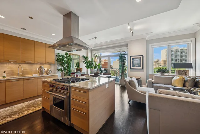 a kitchen with a stove and a refrigerator
