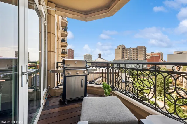 a balcony with a city view