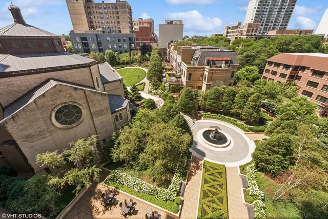 a view of a house with backyard and balcony