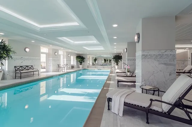 a very nice looking dining room with a large window