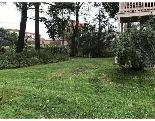 20 Marble Street Worcester, MA 01603 - Photo 11 of 30 a big yard with lots of green space and trees