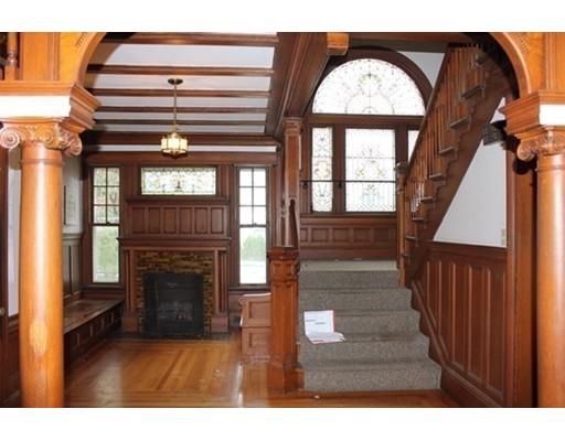20 Marble Street Worcester, MA 01603 - Photo 14 of 30 a view of hall with wooden floor a fireplace and a window
