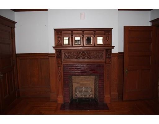 20 Marble Street Worcester, MA 01603 - Photo 21 of 30 a view of wooden floor windows and a fireplace