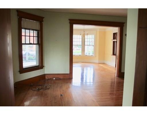 20 Marble Street Worcester, MA 01603 - Photo 24 of 30 a view of an empty room with wooden floor and a window