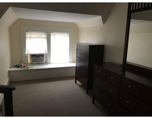 20 Marble Street Worcester, MA 01603 - Photo 27 of 30 a living room with furniture window and a table